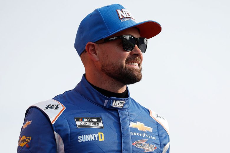 Ricky Stenhouse Jr. looks on.
