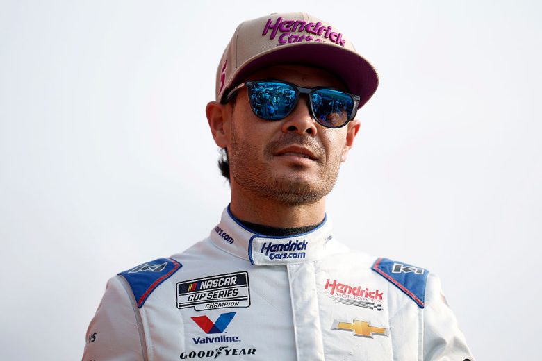 Kyle Larson looks on.