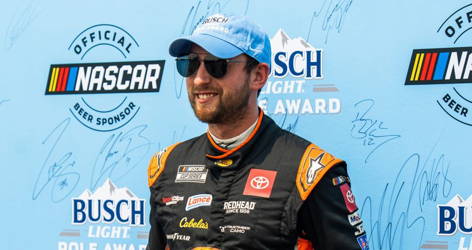 chase briscoe celebrates his nascar cup series pole at michigan