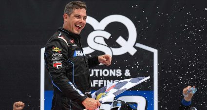 Stewart Friesen celebrates his first Truck Series win since 2022 in Victory Lane at Michigan International Speedway
