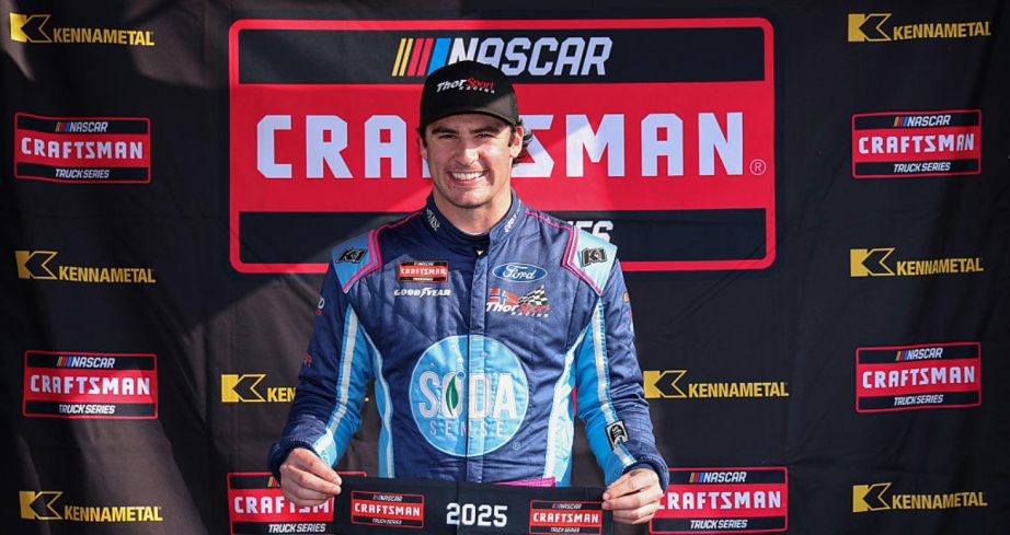 Luke Fenhaus celebrates after winning the pole at Michigan.