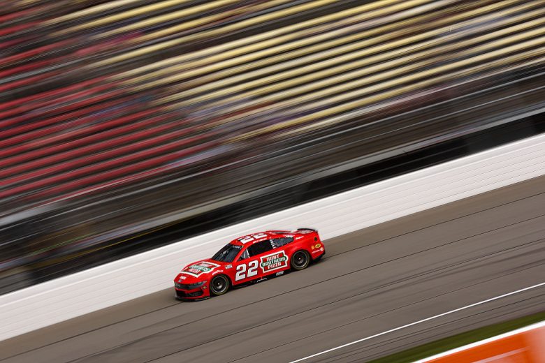 Joey Logano drives at Michigan.