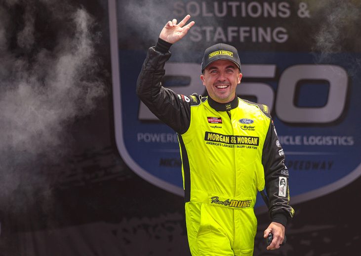 Frankie Muniz waves to fans at Michigan.