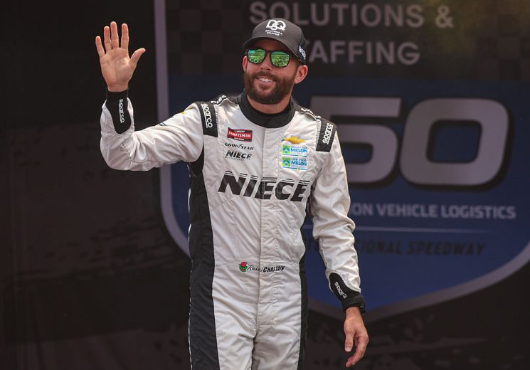 Ross Chastain waves to fans at Michigan.
