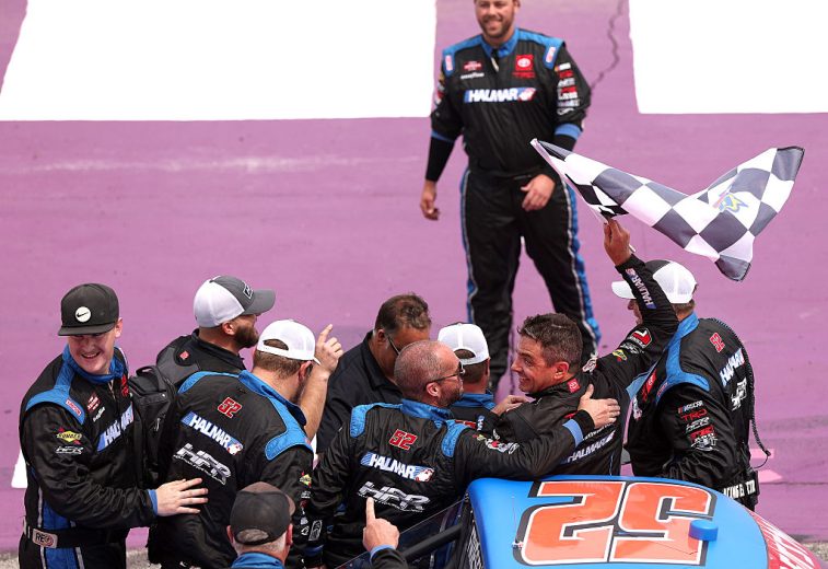 Stewart Friesen celebrates with his team at Michigan.