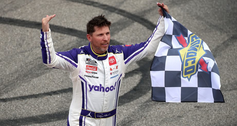 denny hamlin celebrates his nascar cup series win at michigan