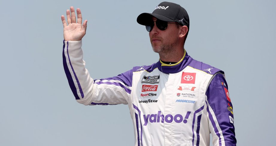 Denny Hamlin waves during driver intros.