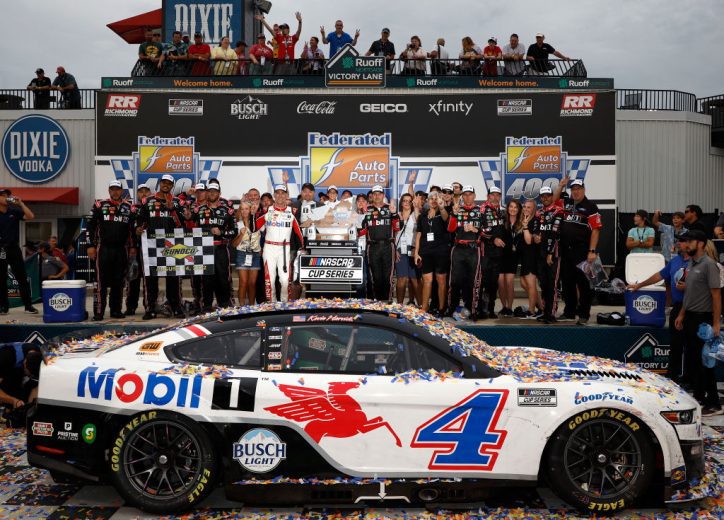 Kevin Harvick and his team pose for a photo in Victory Lane at Richmond Raceway.