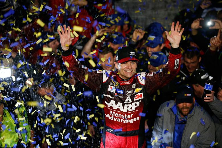 Jeff Gordon celebrates in Victory Lane following his NASCAR Cup Series win at Martinsville Speedway.