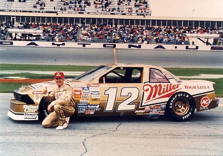 Bobby Allison poses with his No. 12 Buick at Daytona International Speedway.