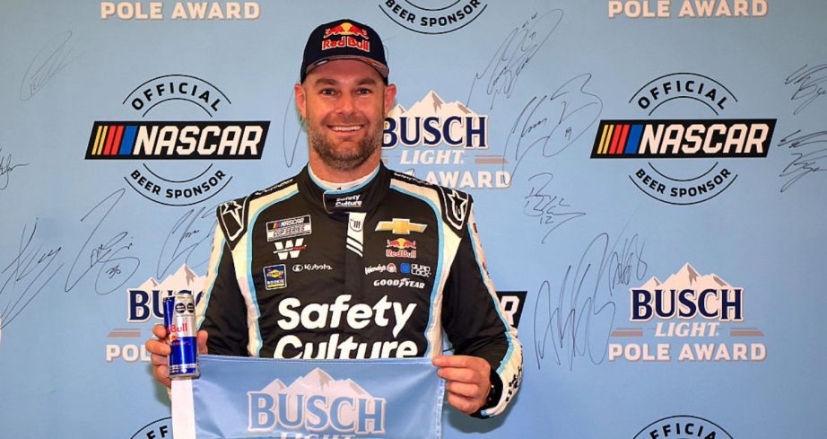 Shane van Gisbergen celebrates after winning the pole in Mexico City.