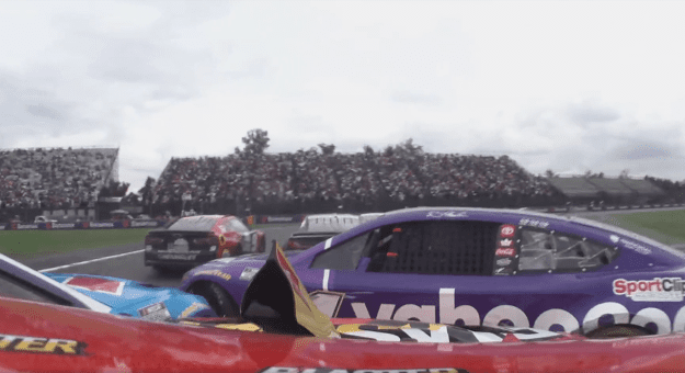 Elbows out! Chaos ensues in midpack through first corners on restart