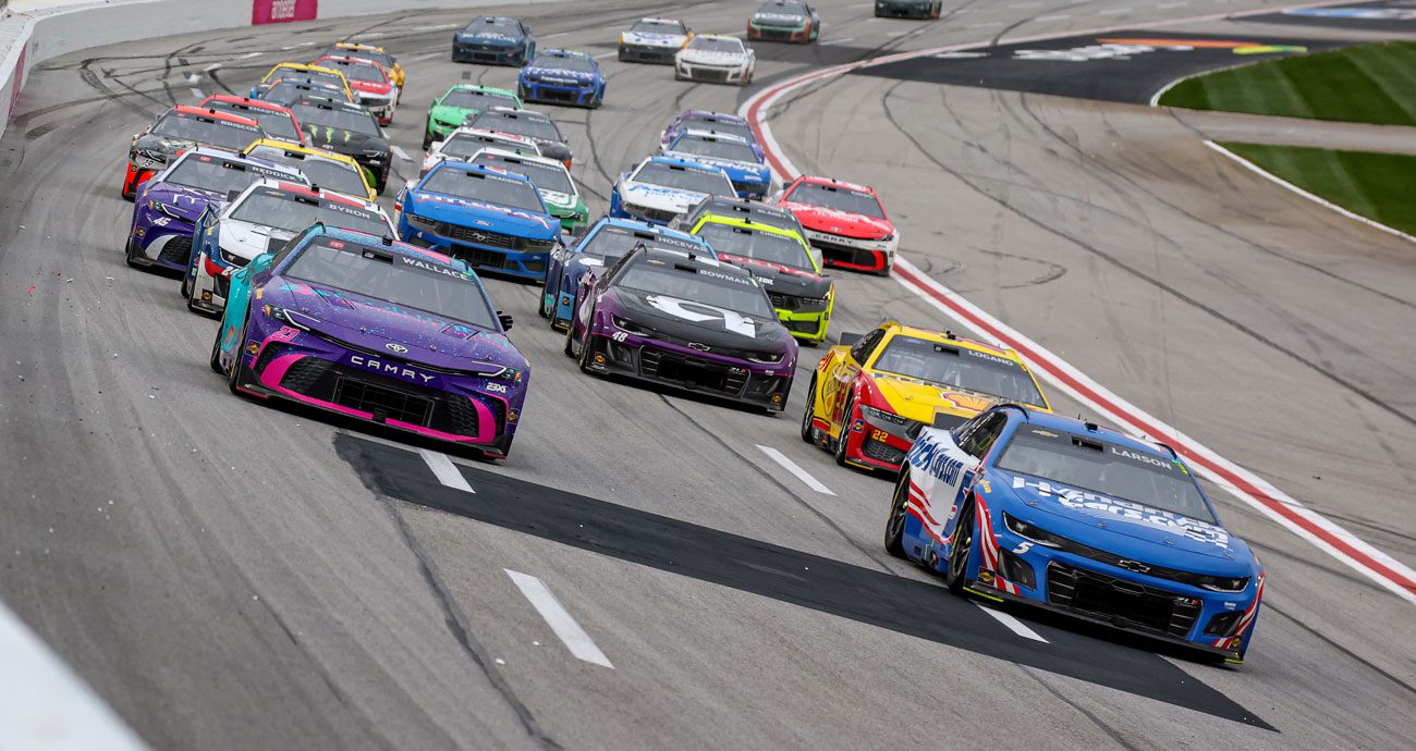 NASCAR Cup Series cars race at Atlanta Motor Speedway.