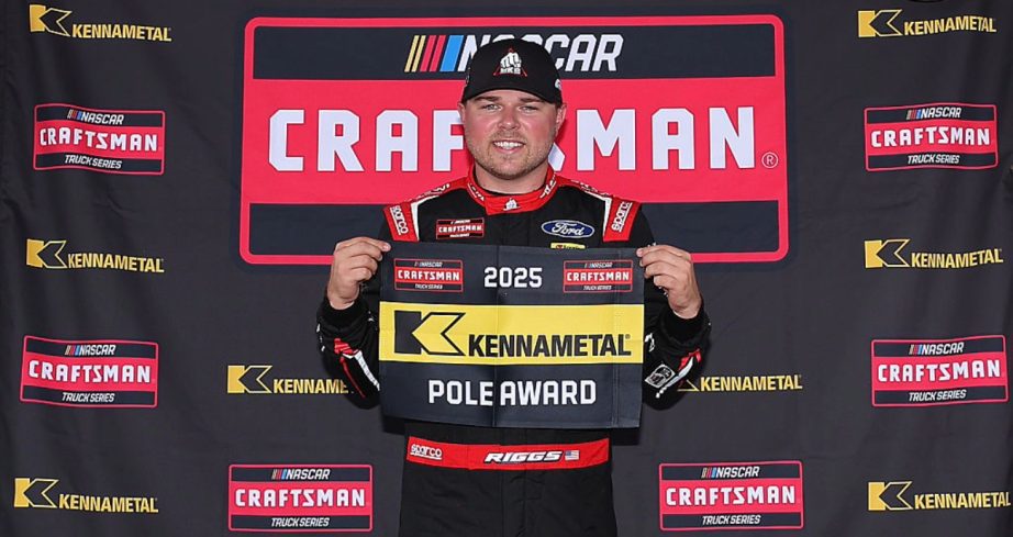 Layne Riggs celebrates after winning the pole at Pocono.