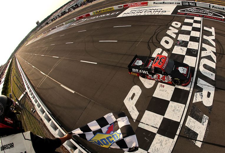 Layne Riggs takes the checkered flag at Pocono.