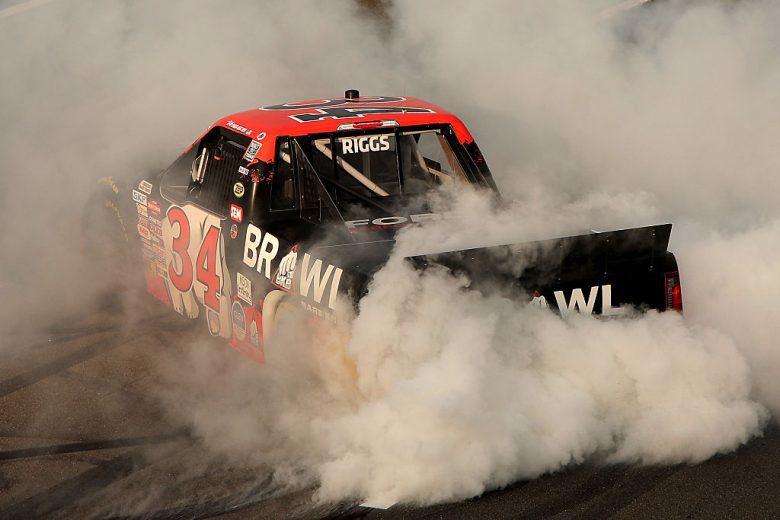 Layne Riggs does a burnout after winning at Pocono.