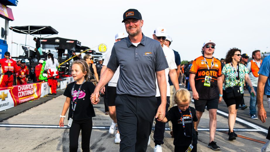 Dale Earnhardt Jr. and his daughters walk at Pocono.