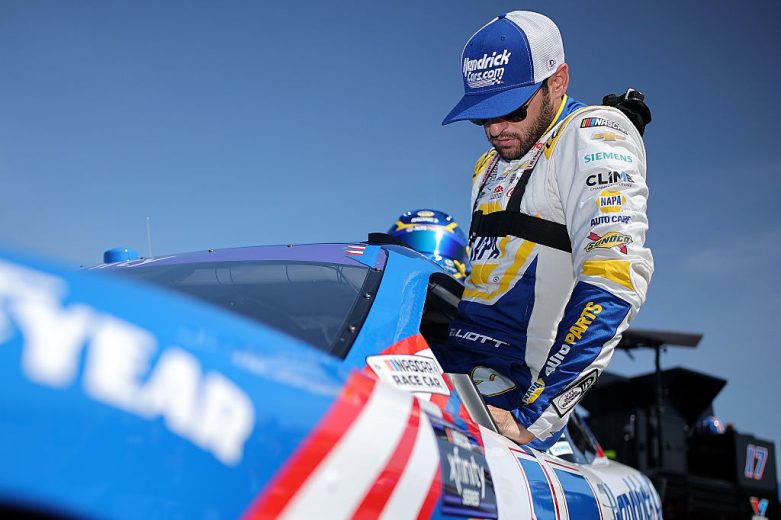 Chase Elliott gets in his car at Pocono.