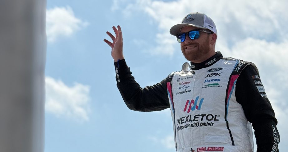 Chris Buescher waves to fans during driver intros at Pocono.