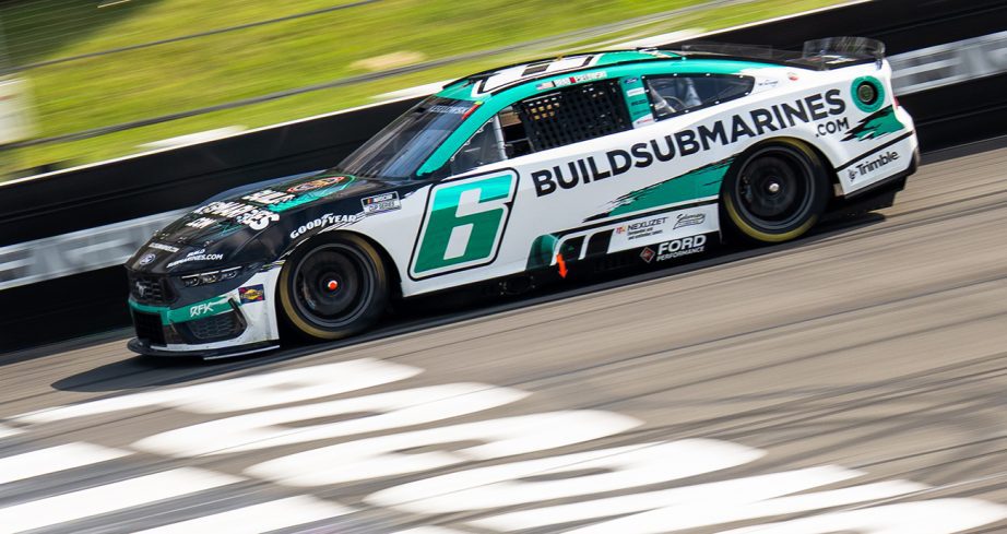 Brad Keselowski drives down the frontstretch at Pocono Raceway.