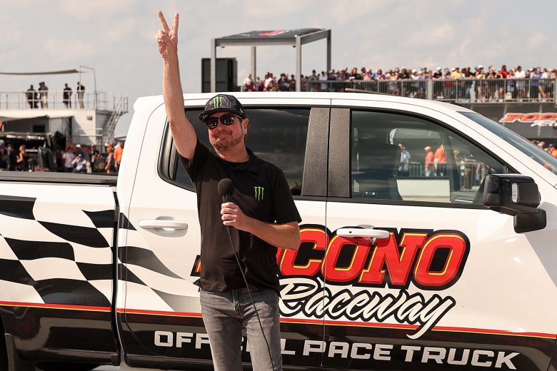 Kurt Busch waves to fans before he gives the command at Pocono.