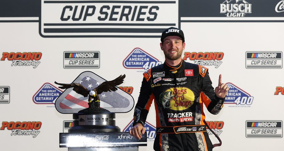Chase Briscoe poses with trophy in Victory Lane.