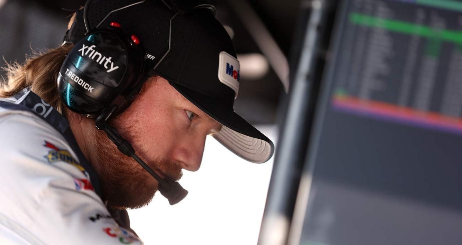 Tyler Reddick checks over the data during practice and qualifying sessions at Michigan International Speedway