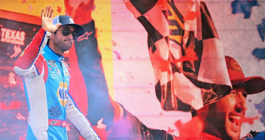 Chase Elliott walks out during driver intros.