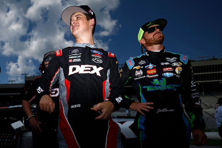 Harrison Burton and Jeb Burton look on at EchoPark Speedway.