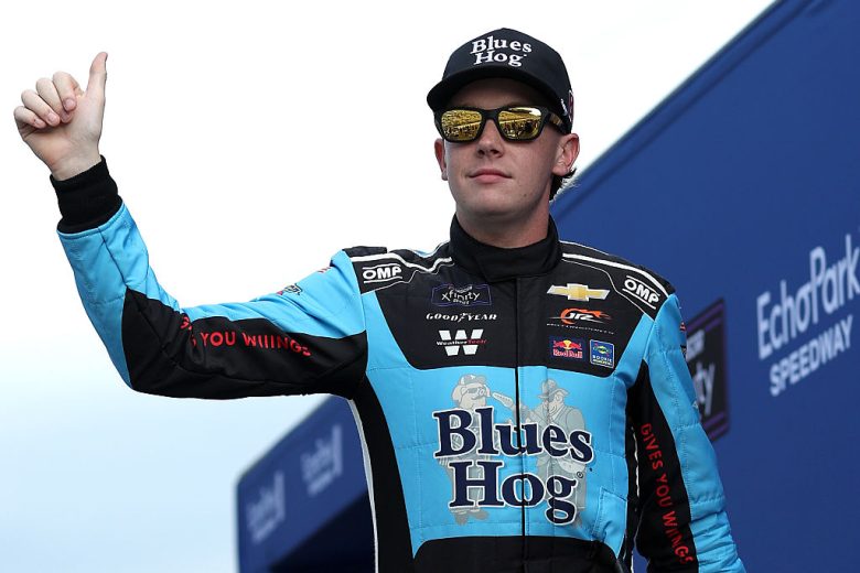 Connor Zilisch waves to fans at EchoPark Speedway.