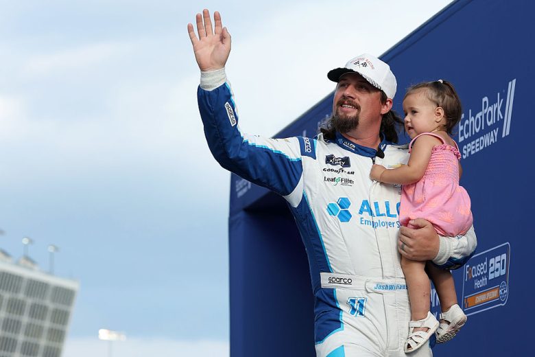 Josh Williams waves to fans at EchoPark Speedway.