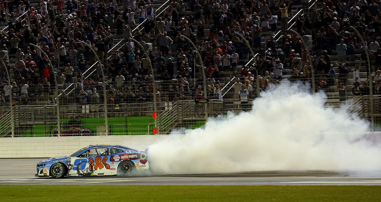 chase elliott celebrates his nascar cup series win at echopark speedway