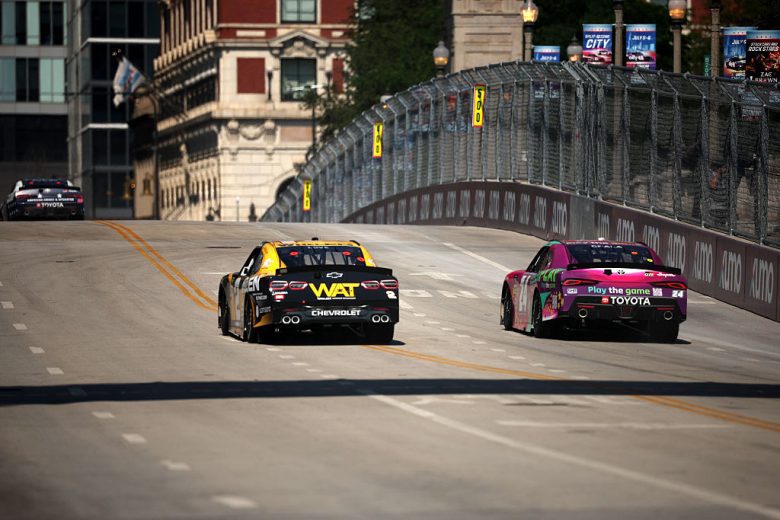 Jesse Love and Kaz Grala drive at Chicago.