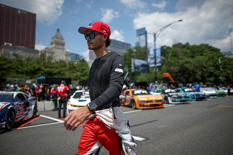 Kyle Larson looks on at Chicago.