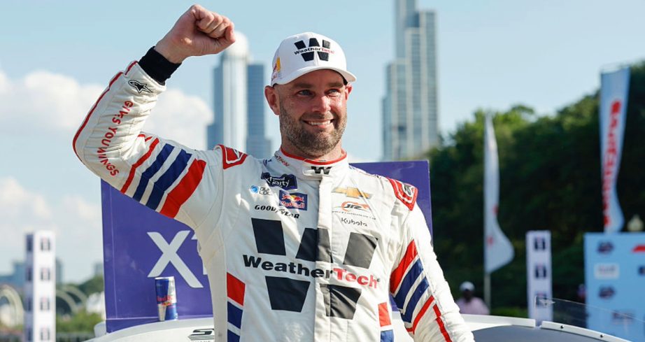 Shane van Gisbergen celebrates after winning at Chicago.