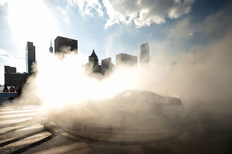 Shane van Gisbergen celebrates after winning at Chicago.
