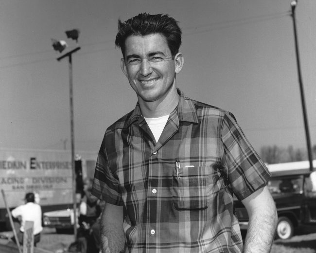 Bobby Allison smiles and looks on.