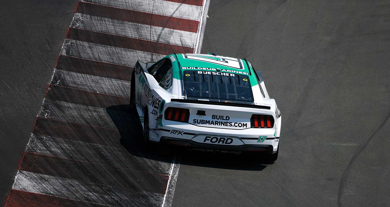 Chris Buescher's No. 17 Ford rolls over the curbing at Sonoma Raceway