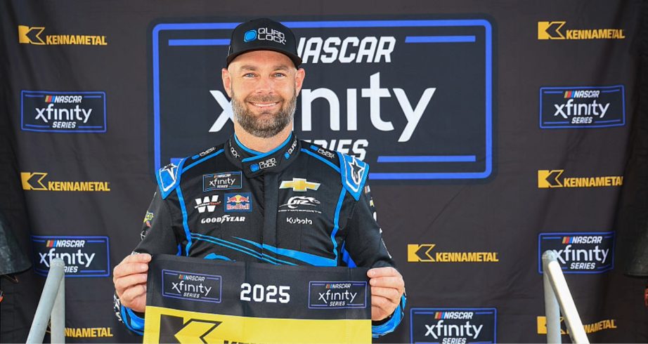 Shane van Gisbergen celebrates after winning the pole at Sonoma.