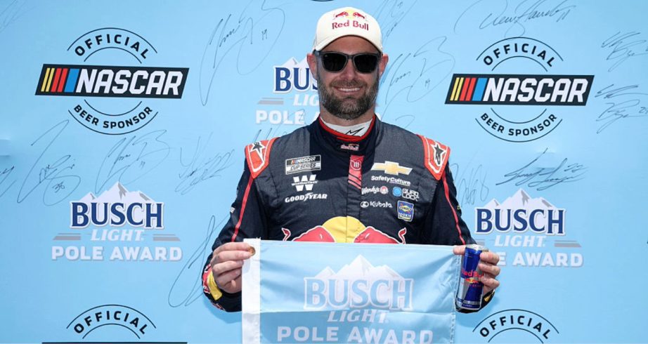 Shane van Gisbergen celebrates after winning the pole at Sonoma.
