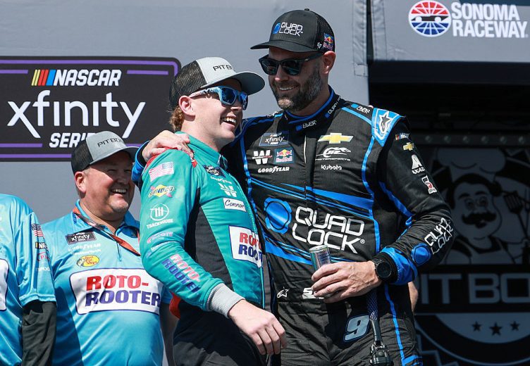 Connor Zilisch and Shane van Gisbergen talk it over in Victory Lane at Sonoma Raceway