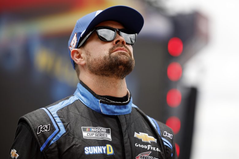 Ricky Stenhouse Jr. looks on.