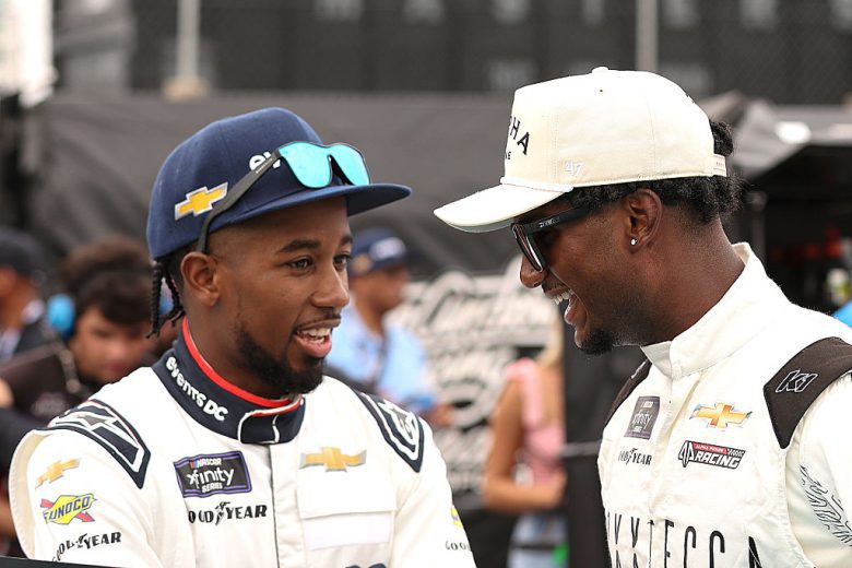Rajah Caruth and Lavar Scott chat at Dover.