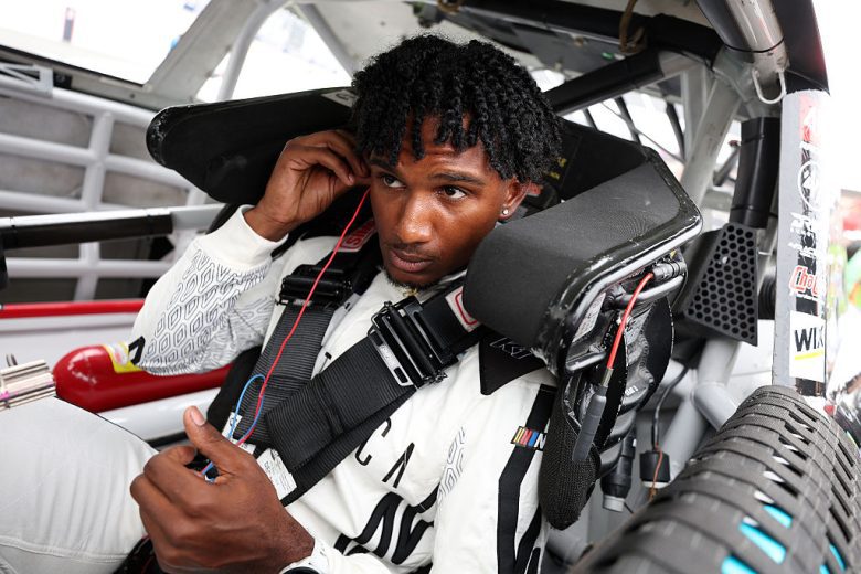 Lavar Scott sits in his car at Dover.