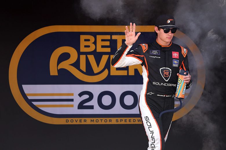 William Sawalich waves to fans at Dover.