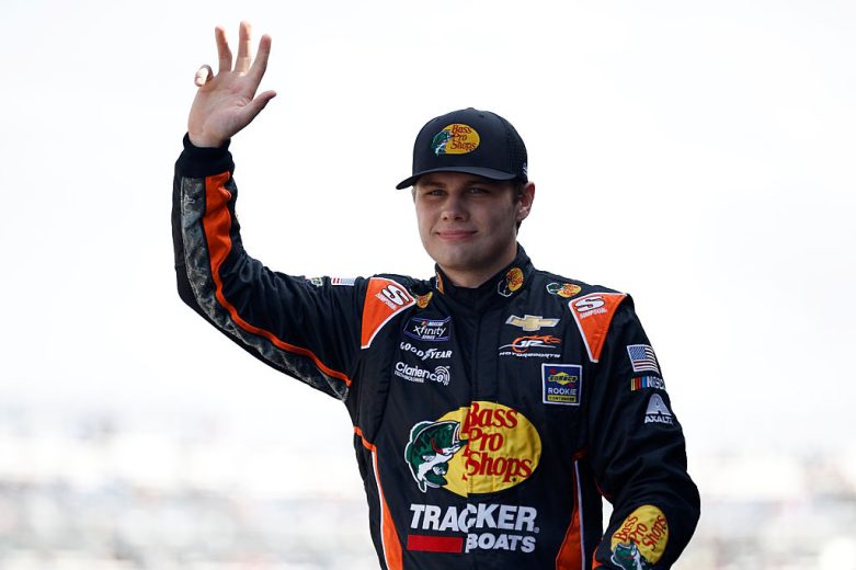 Carson Kvapil waves to fans at Dover.