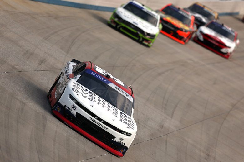 Rajah Caruth drives at Dover.