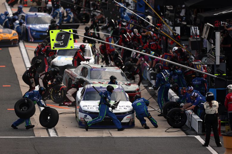 Ross Chastain and others pit at Dover.