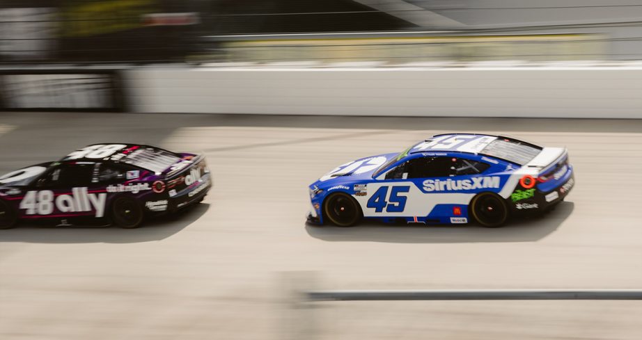 Tyler Reddick tracks down Alex Bowman during the race at Dover.
