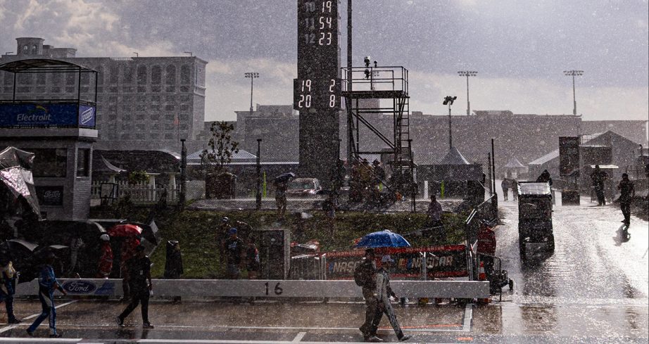 View of rain pouring at Dover with people hold umbrellas.